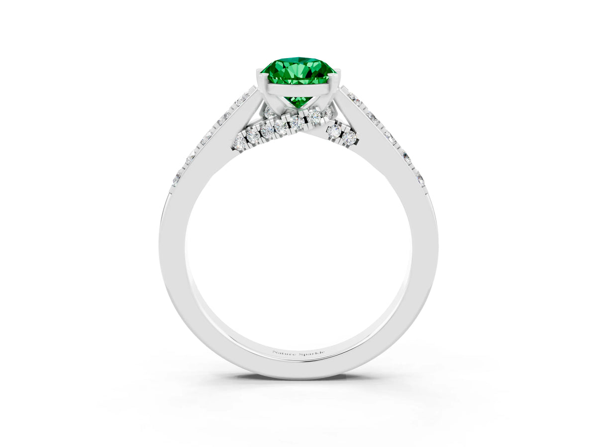 Pear Cut Emerald Solitaire Ring in Platinum with Crossover Gallery and Round Pavé Band_3
