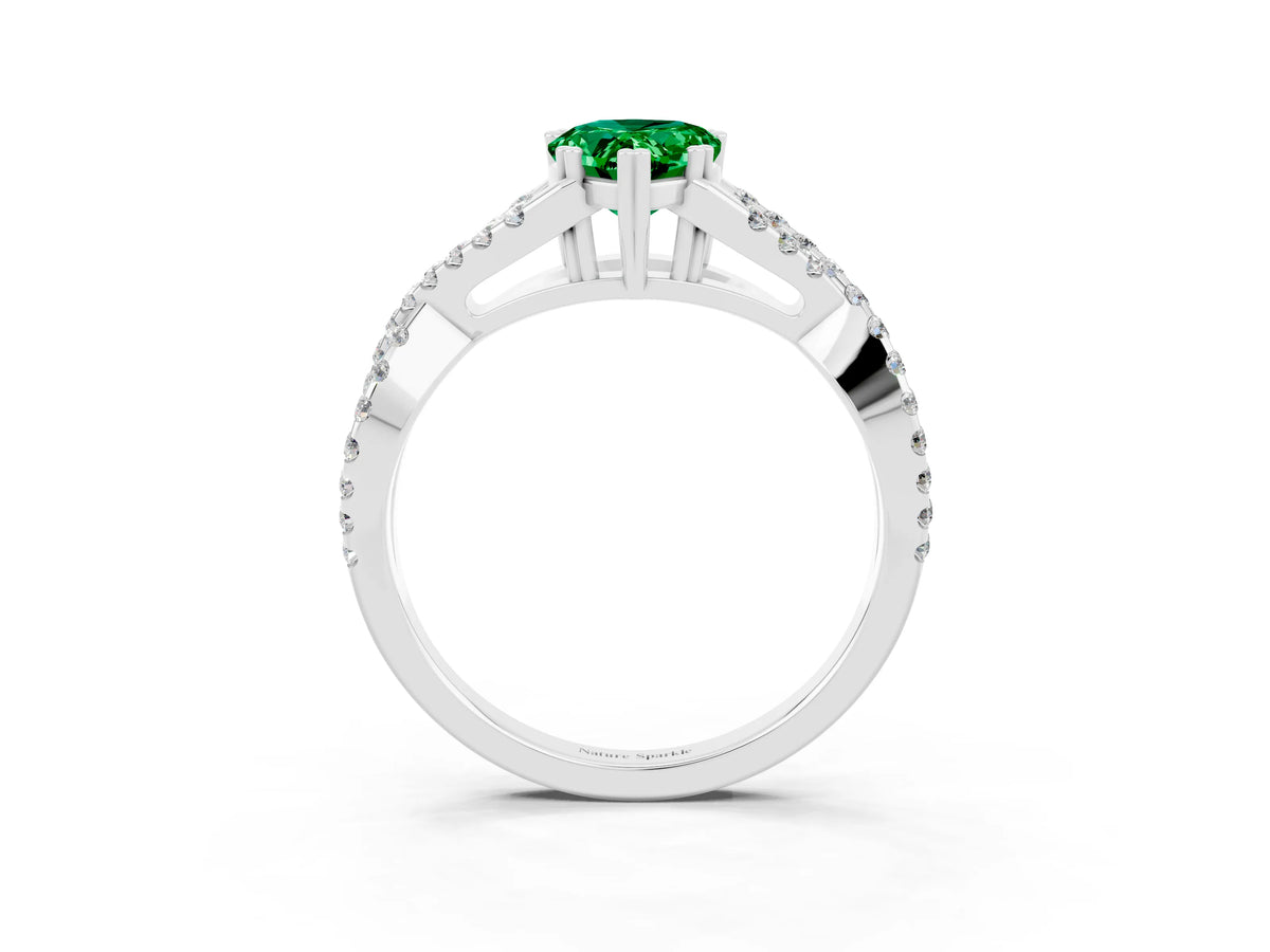 Pear Cut Emerald Solitaire Ring in Platinum with Interwoven Pavé Band and Prong Setting_9