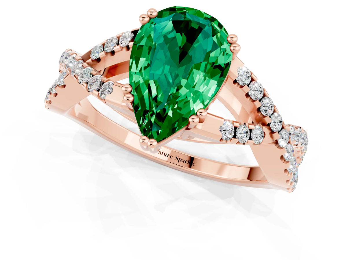 Pear Cut Emerald Solitaire Ring in Rose gold with Interwoven Pavé Band and Prong Setting_1