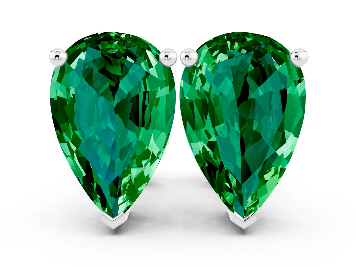 Pear Cut Emerald Stud Earrings in White gold with Basket Setting