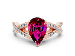 Pear Cut Garnet Solitaire Ring in Rose gold with Interwoven Pavé Band and Prong Setting
