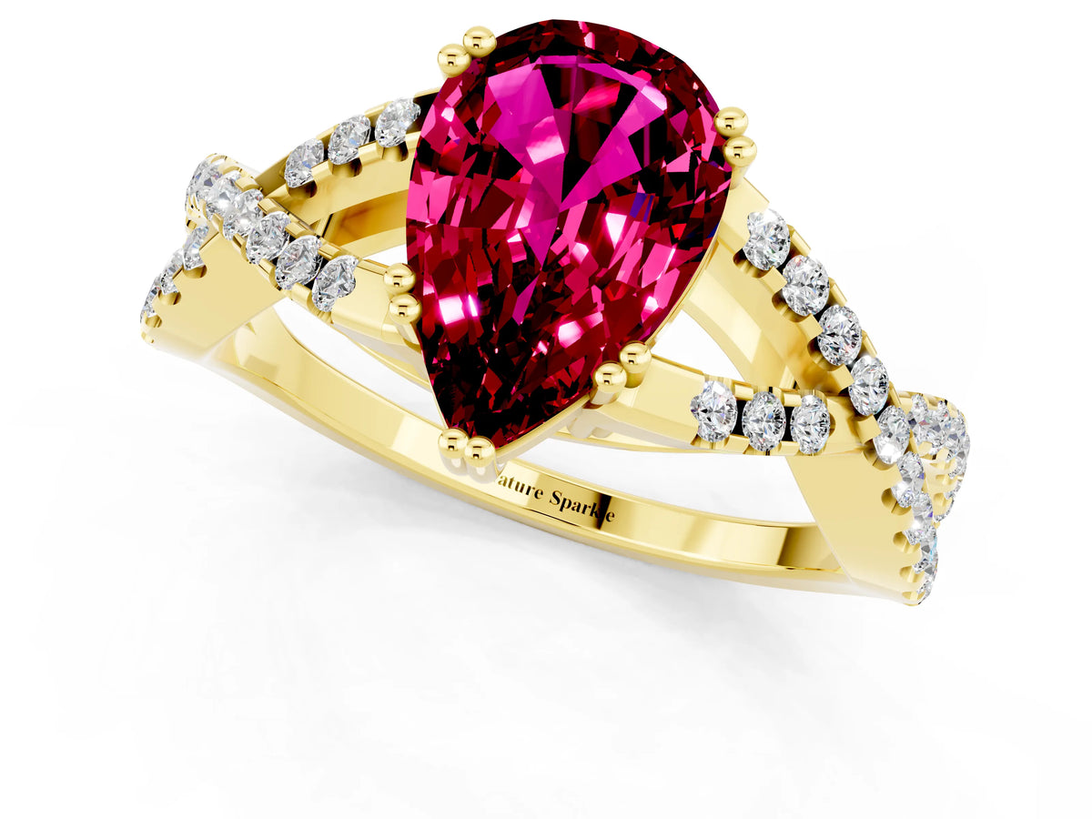 Pear Cut Garnet Solitaire Ring in Yellow gold with Interwoven Pavé Band and Prong Setting_1