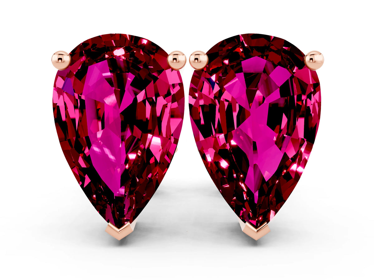 Pear Cut Garnet Stud Earrings in Rose gold with Basket Setting
