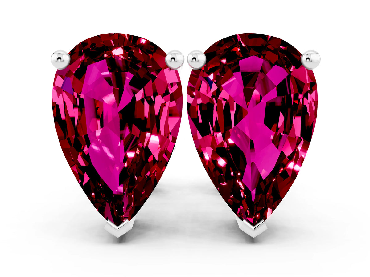 Pear Cut Garnet Stud Earrings in White gold with Basket Setting