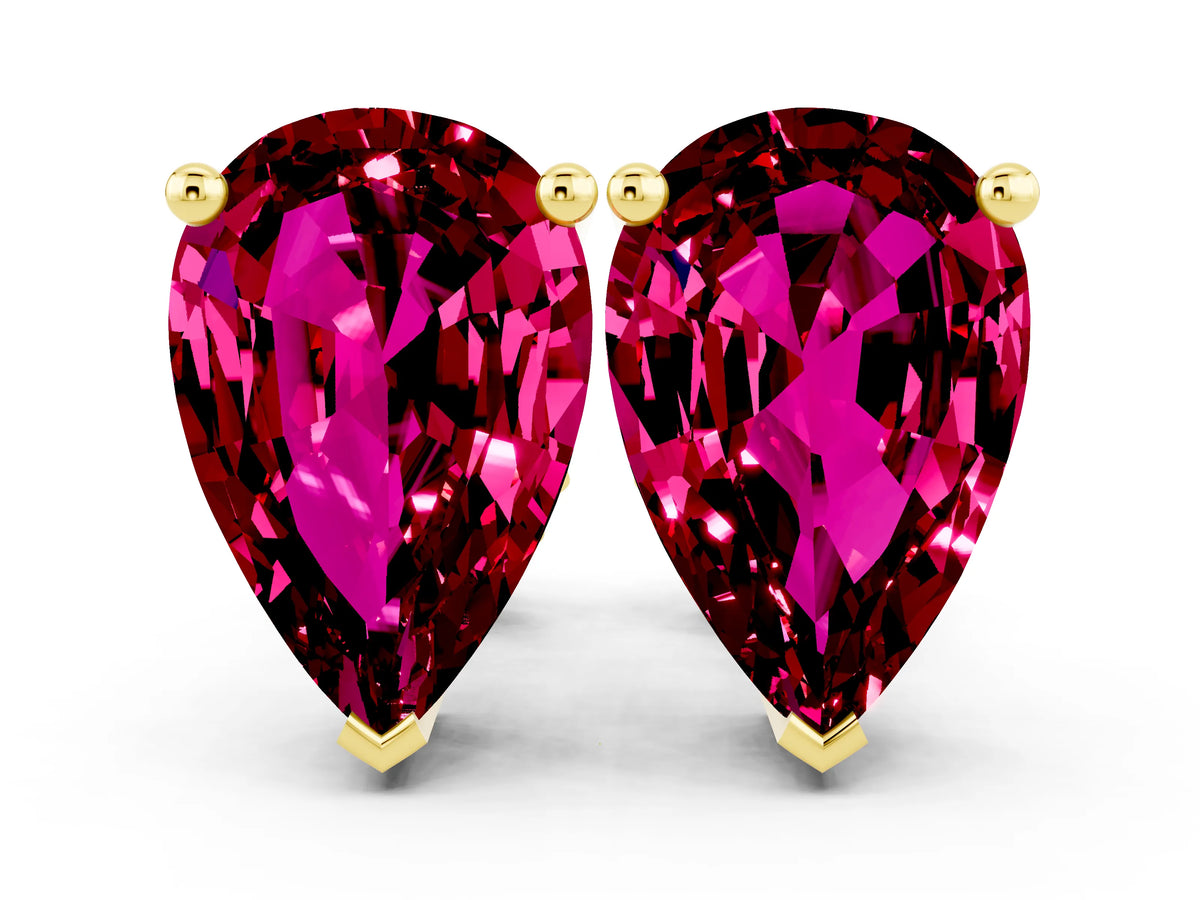Pear Cut Garnet Stud Earrings in Yellow gold with Basket Setting