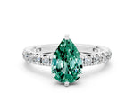 Pear Cut Green Sapphire Pavé Solitaire Ring in White gold with Round Pavé Band and Prong Setting