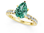 Pear Cut Green Sapphire Pavé Solitaire Ring in Yellow gold with Round Pavé Band and Prong Setting_1
