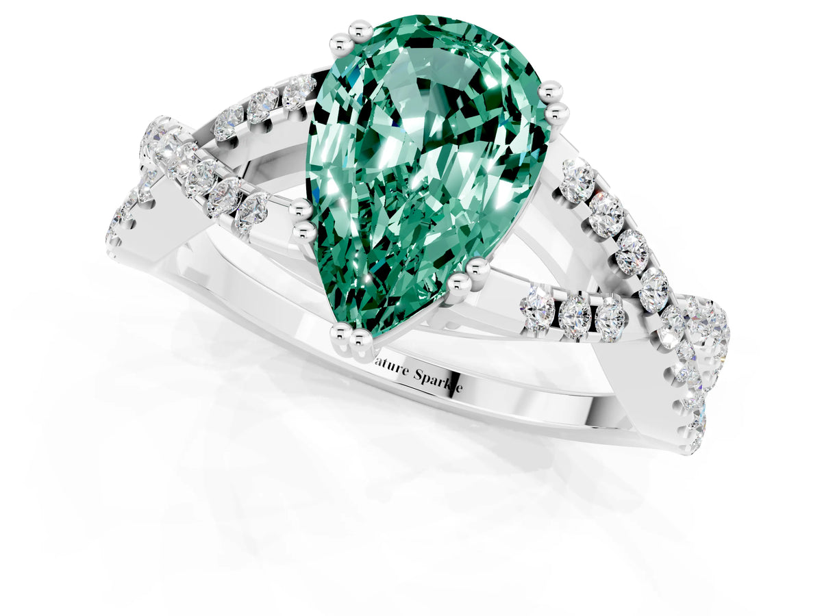 Pear Cut Green Sapphire Solitaire Ring in Silver with Interwoven Pavé Band and Prong Setting_7