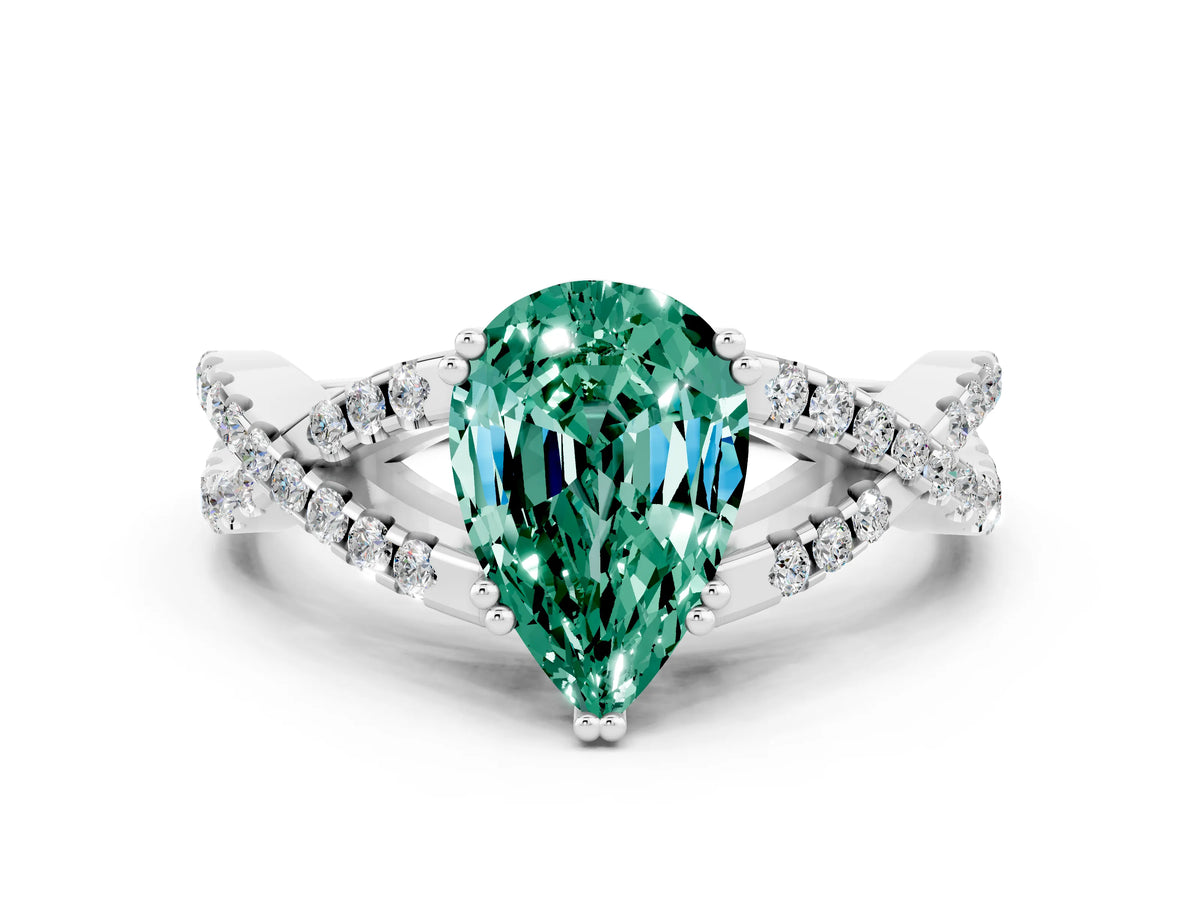 Pear Cut Green Sapphire Solitaire Ring in White gold with Interwoven Pavé Band and Prong Setting