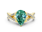 Pear Cut Green Sapphire Solitaire Ring in Yellow gold with Interwoven Pavé Band and Prong Setting