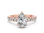 Pear Cut Moissanite Pavé Solitaire Ring in Rose gold with Round Pavé Band and Prong Setting