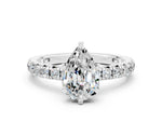 Pear Cut Moissanite Pavé Solitaire Ring in White gold with Round Pavé Band and Prong Setting