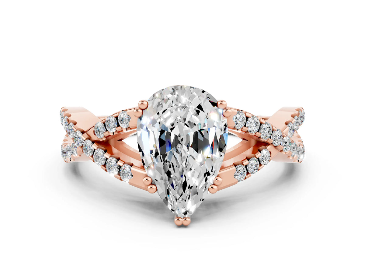 Pear Cut Moissanite Solitaire Ring in Rose gold with Interwoven Pavé Band and Prong Setting