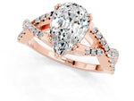 Pear Cut Moissanite Solitaire Ring in Rose gold with Interwoven Pavé Band and Prong Setting_1