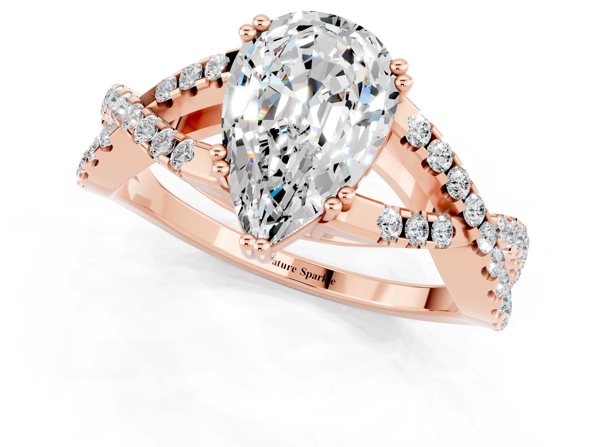 Pear Cut Moissanite Solitaire Ring in Rose gold with Interwoven Pavé Band and Prong Setting_1