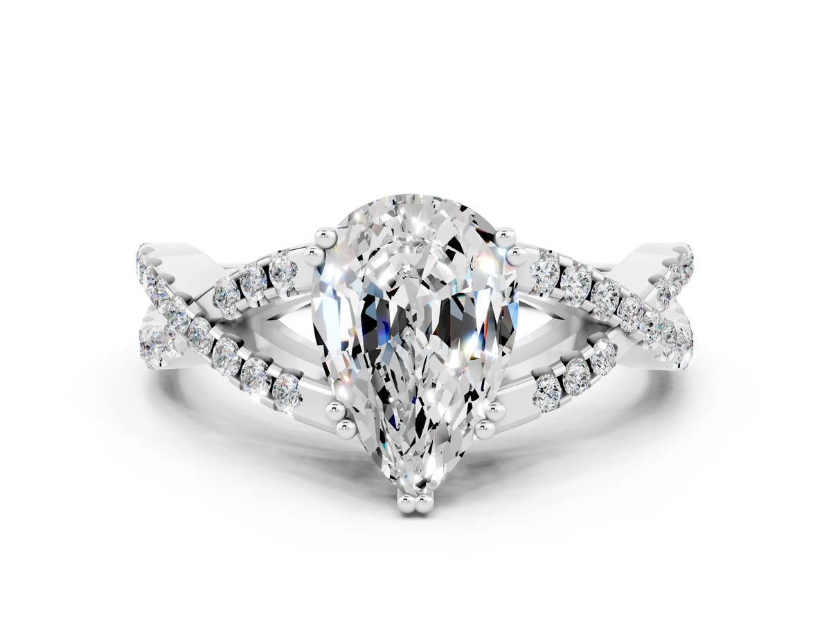 Pear Cut Moissanite Solitaire Ring in White gold with Interwoven Pavé Band and Prong Setting