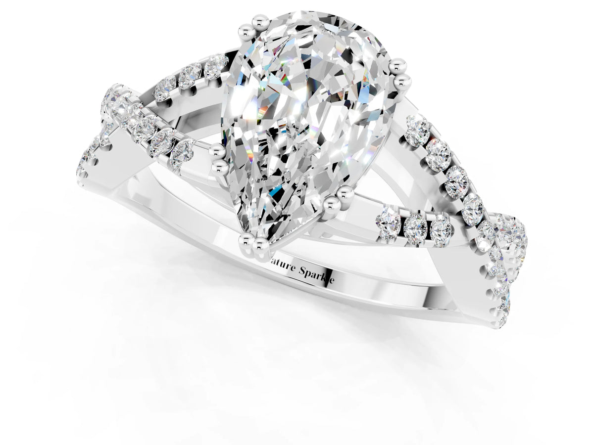 Pear Cut Moissanite Solitaire Ring in White gold with Interwoven Pavé Band and Prong Setting_1