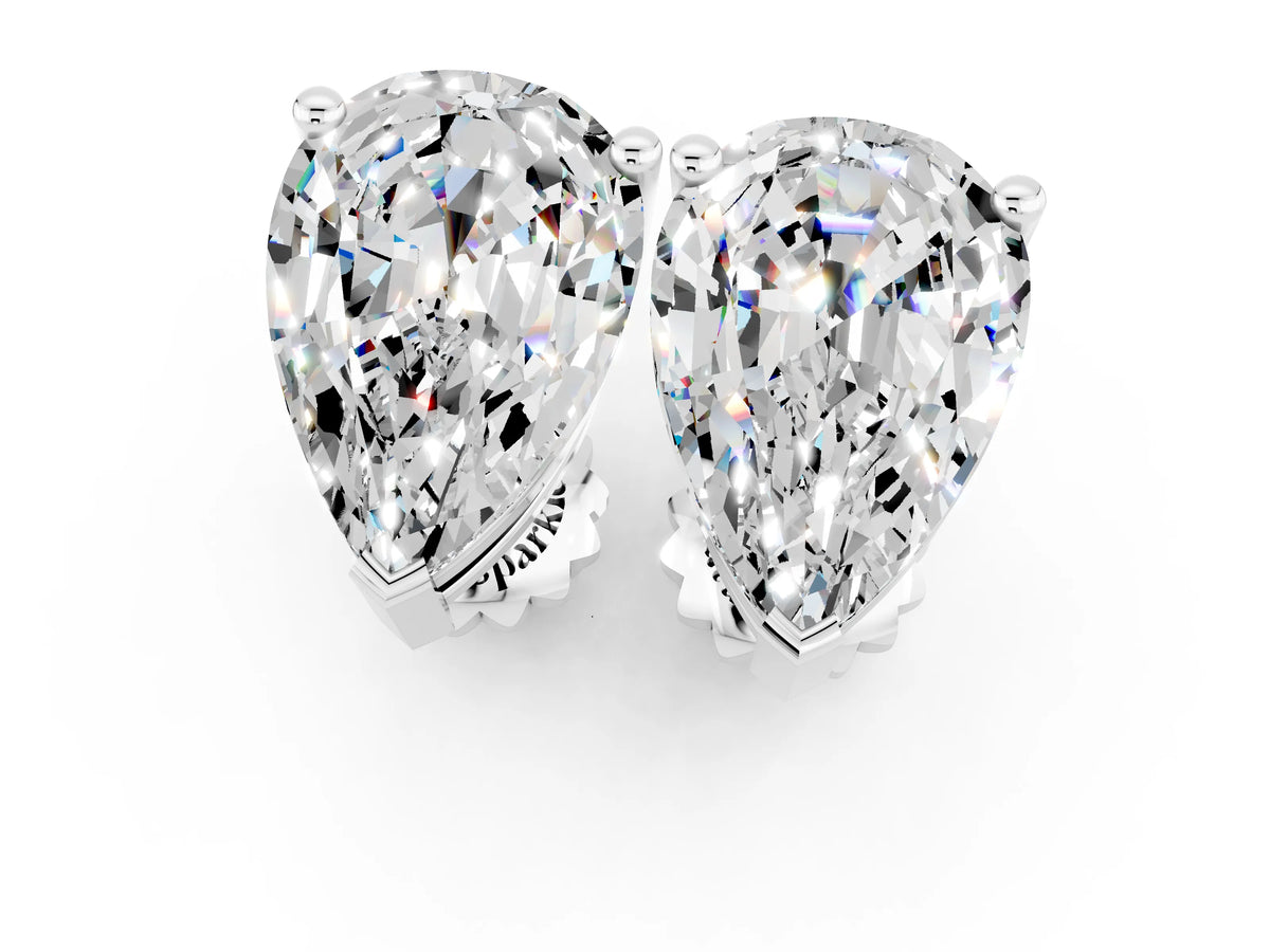 Pear Cut Moissanite Stud Earrings in White gold with Basket Setting_1