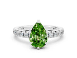 Pear Cut Peridot Pavé Solitaire Ring in Silver with Round Pavé Band and Prong Setting