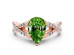 Pear Cut Peridot Solitaire Ring in Rose gold with Interwoven Pavé Band and Prong Setting