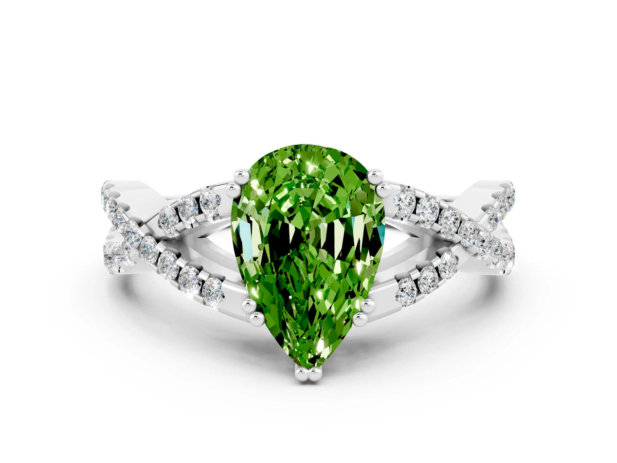 Pear Cut Peridot Solitaire Ring in White gold with Interwoven Pavé Band and Prong Setting