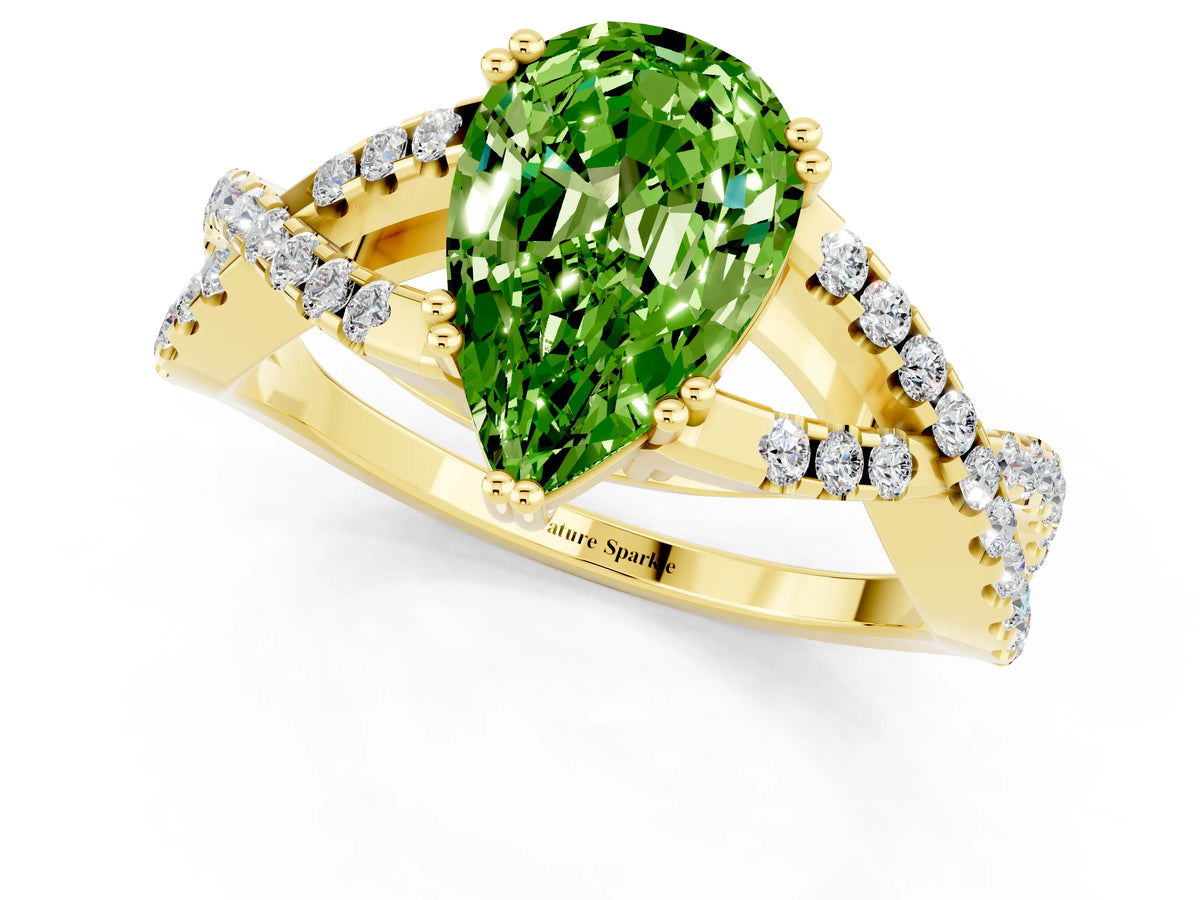 Pear Cut Peridot Solitaire Ring in Yellow gold with Interwoven Pavé Band and Prong Setting_1