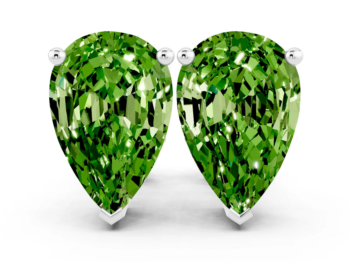 Pear Cut Peridot Stud Earrings in White gold with Basket Setting