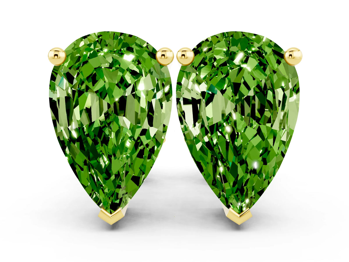 Pear Cut Peridot Stud Earrings in Yellow gold with Basket Setting
