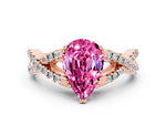 Pear Cut Pink Sapphire Solitaire Ring in Rose gold with Interwoven Pavé Band and Prong Setting