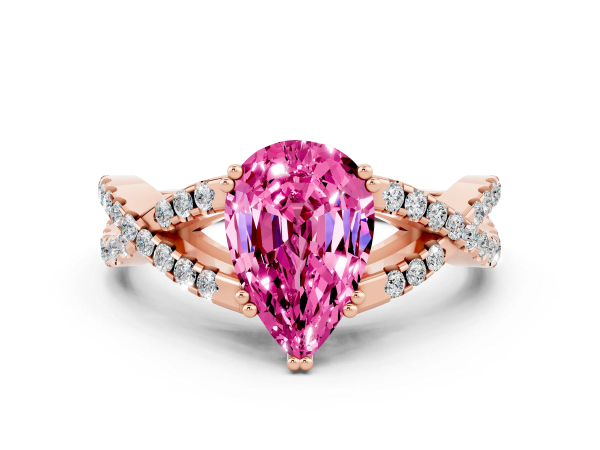 Pear Cut Pink Sapphire Solitaire Ring in Rose gold with Interwoven Pavé Band and Prong Setting