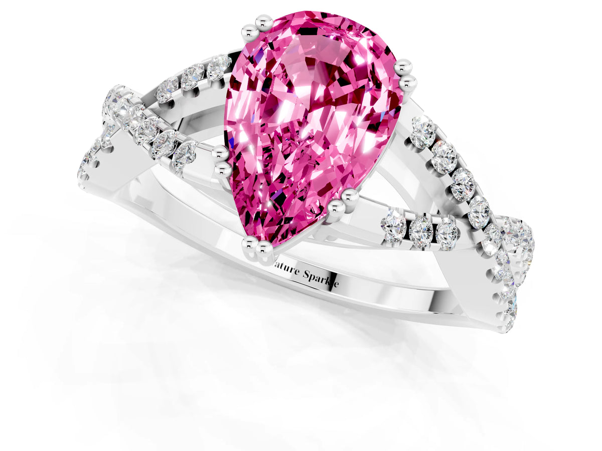 Pear Cut Pink Sapphire Solitaire Ring in White gold with Interwoven Pavé Band and Prong Setting_1