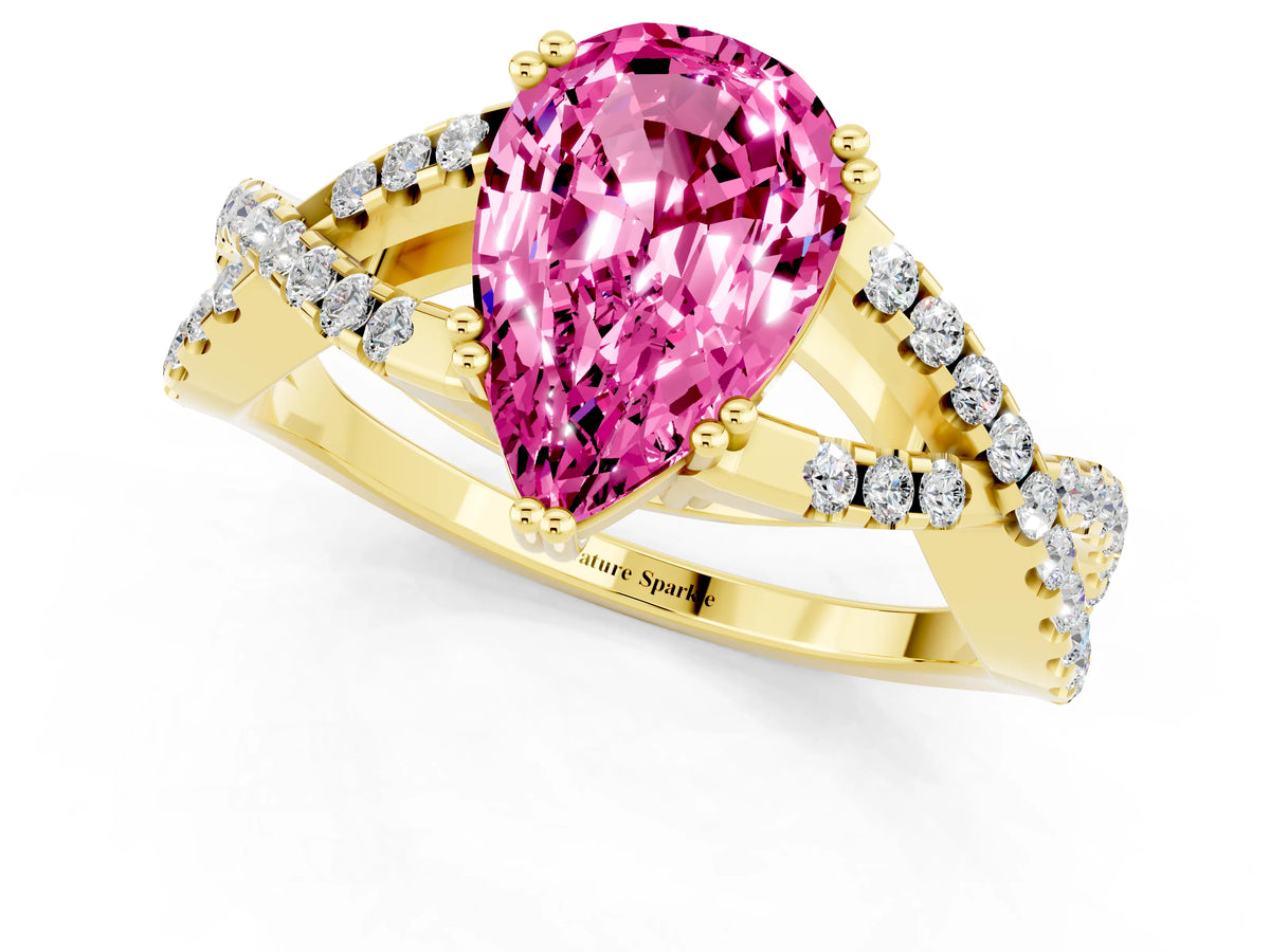 Pear Cut Pink Sapphire Solitaire Ring in Yellow gold with Interwoven Pavé Band and Prong Setting_1