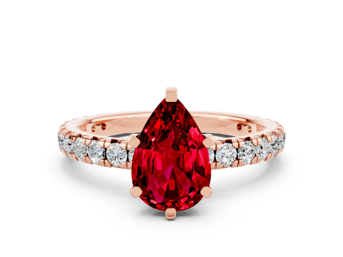 Pear Cut Ruby Pavé Solitaire Ring in Rose gold with Round Pavé Band and Prong Setting
