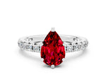 Pear Cut Ruby Pavé Solitaire Ring in Silver with Round Pavé Band and Prong Setting