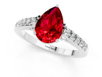Pear Cut Ruby Solitaire Ring in Silver with Crossover Gallery and Round Pavé Band_1