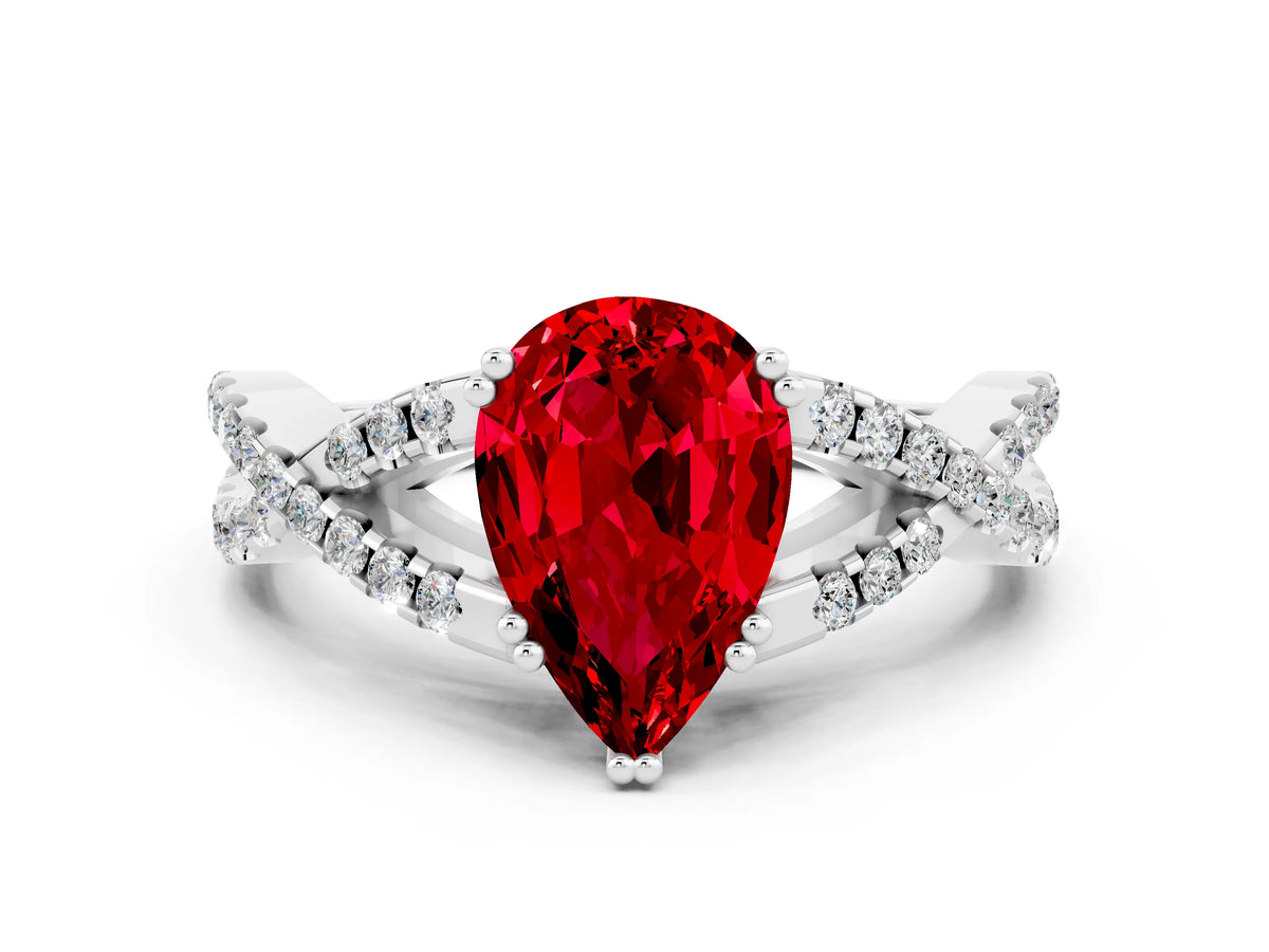 Pear Cut Ruby Solitaire Ring in White gold with Interwoven Pavé Band and Prong Setting