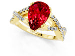 Pear Cut Ruby Solitaire Ring in Yellow gold with Interwoven Pavé Band and Prong Setting_1