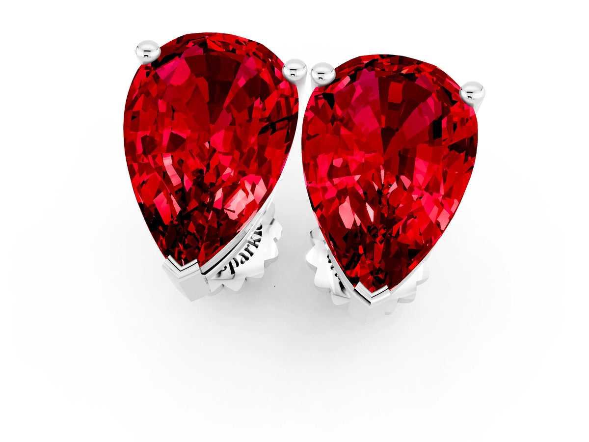Pear Cut Ruby Stud Earrings in White gold with Basket Setting_1