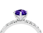 Pear Cut Tanzanite Pavé Solitaire Ring in Silver with Round Pavé Band and Prong Setting_4