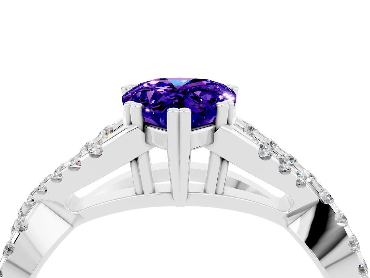 Pear Cut Tanzanite Solitaire Ring in Platinum with Interwoven Pavé Band and Prong Setting_10