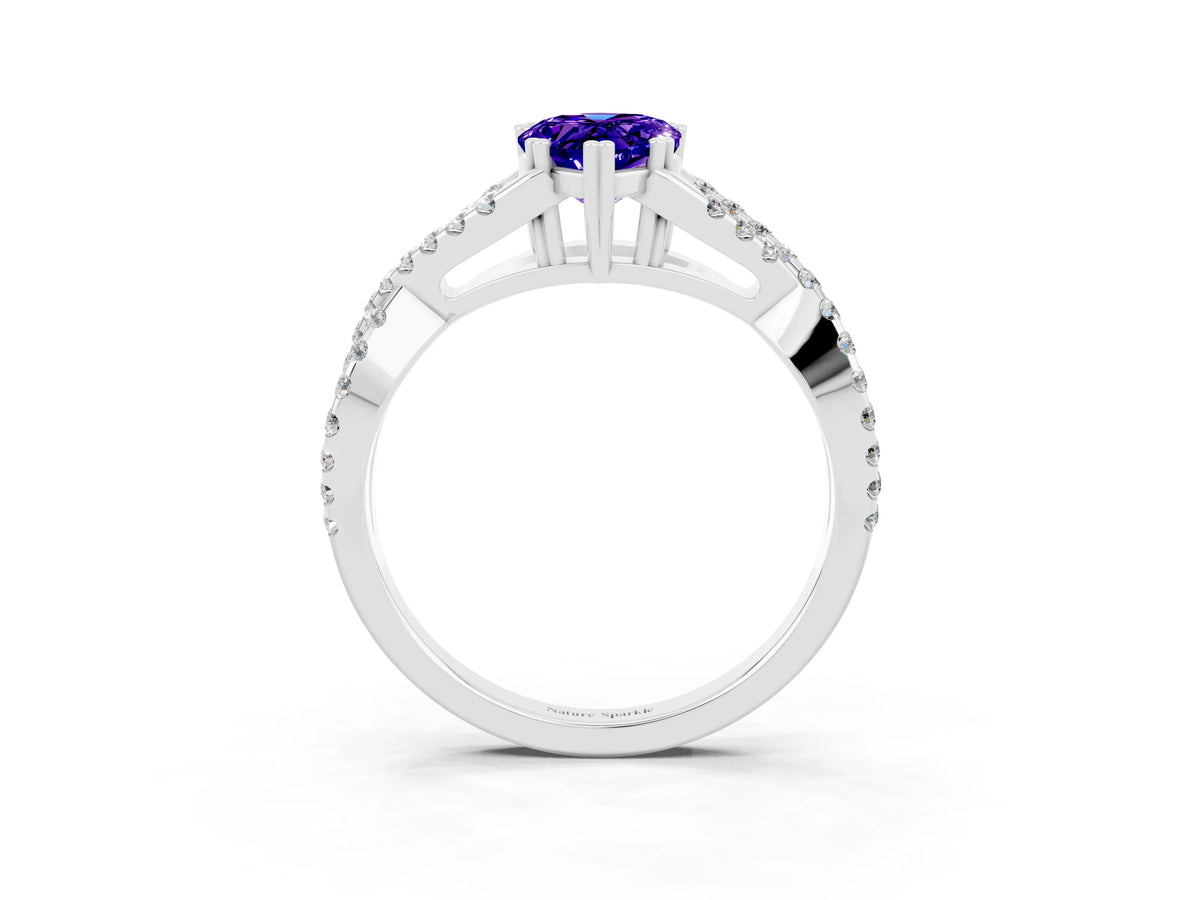 Pear Cut Tanzanite Solitaire Ring in Platinum with Interwoven Pavé Band and Prong Setting_9