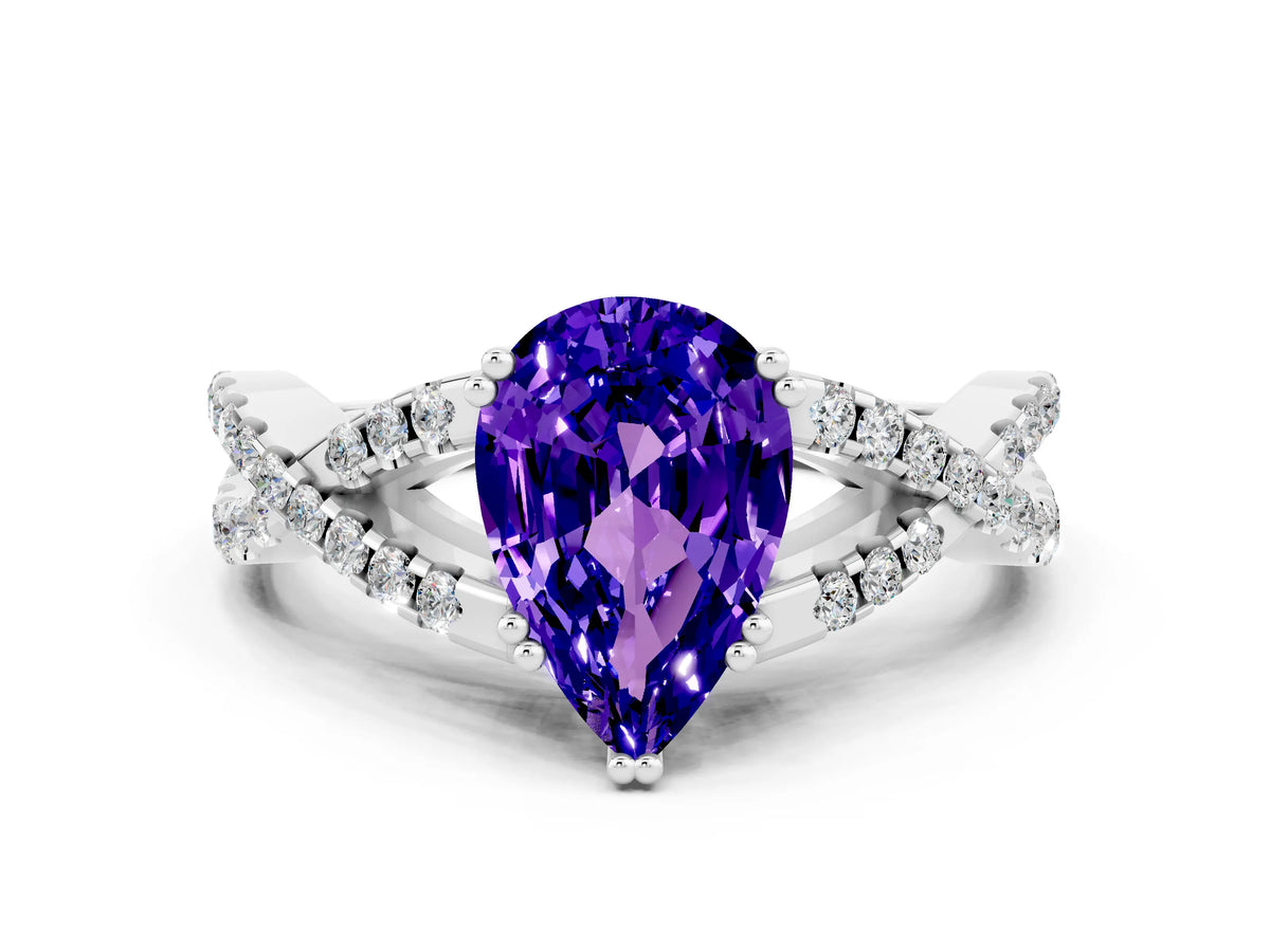Pear Cut Tanzanite Solitaire Ring in White gold with Interwoven Pavé Band and Prong Setting