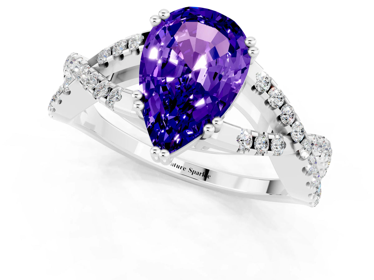 Pear Cut Tanzanite Solitaire Ring in White gold with Interwoven Pavé Band and Prong Setting_1