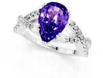 Pear Cut Tanzanite Solitaire Ring in White gold with Interwoven Pavé Band and Prong Setting_1