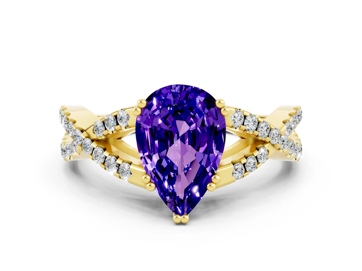 Pear Cut Tanzanite Solitaire Ring in Yellow gold with Interwoven Pavé Band and Prong Setting