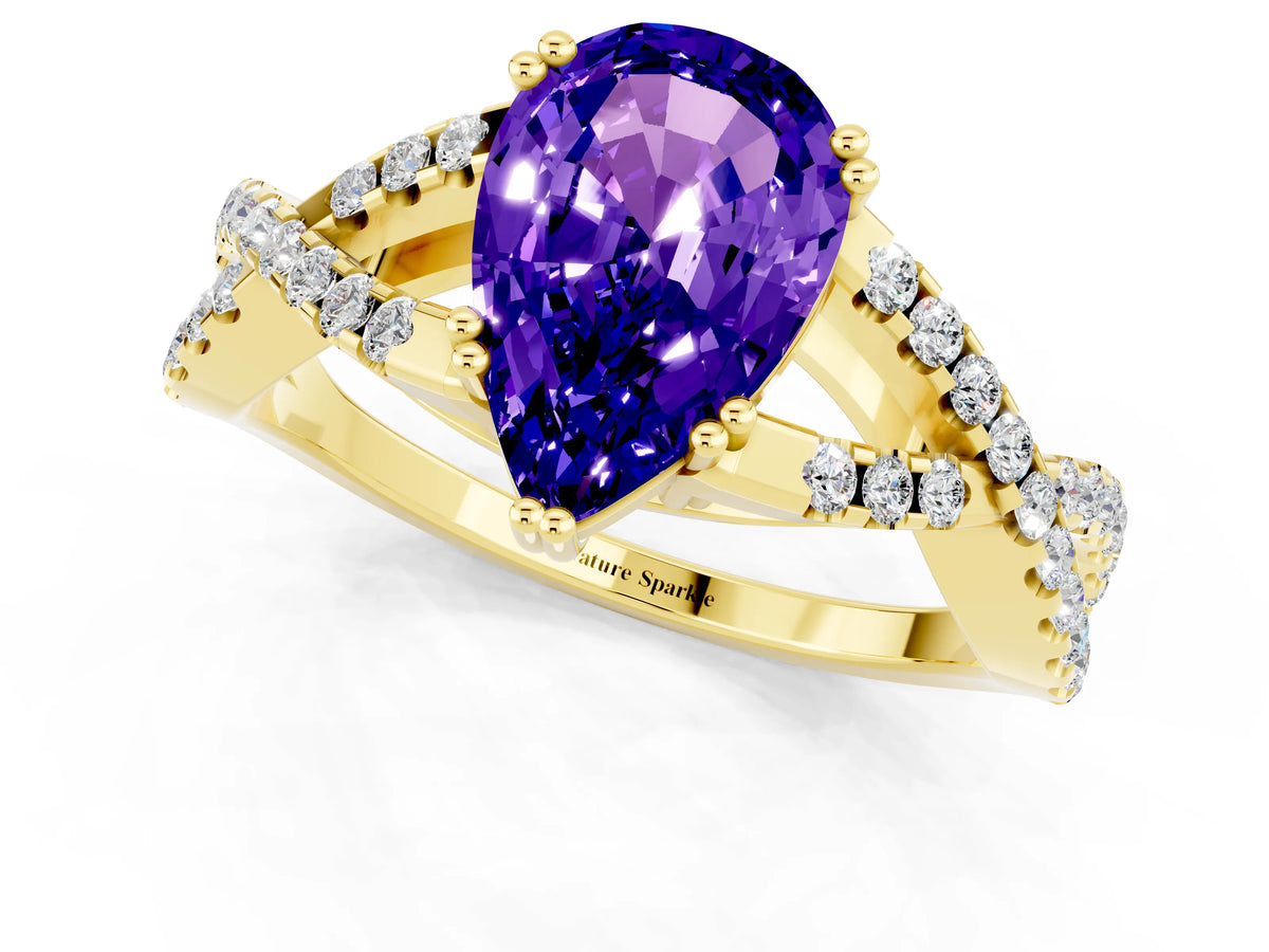 Pear Cut Tanzanite Solitaire Ring in Yellow gold with Interwoven Pavé Band and Prong Setting_1