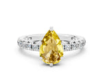 Pear Cut Yellow Sapphire Pavé Solitaire Ring in Platinum with Round Pavé Band and Prong Setting