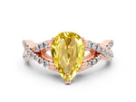 Pear Cut Yellow Sapphire Solitaire Ring in Rose gold with Interwoven Pavé Band and Prong Setting
