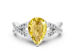 Pear Cut Yellow Sapphire Solitaire Ring in Silver with Interwoven Pavé Band and Prong Setting_6