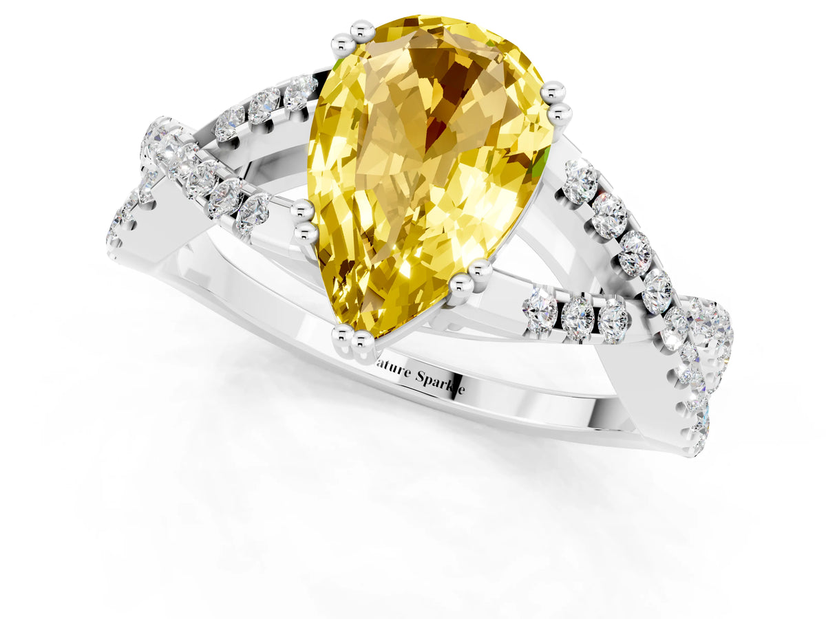Pear Cut Yellow Sapphire Solitaire Ring in Silver with Interwoven Pavé Band and Prong Setting_7